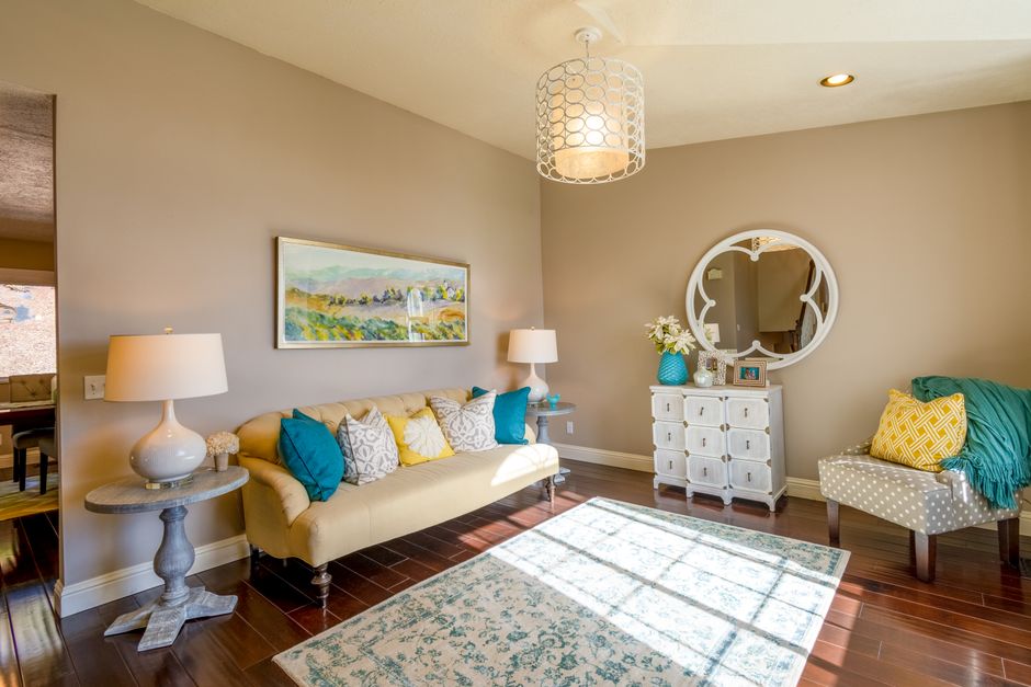 Cozy living room with elegant decor, showcasing modern style and vibrant colors.