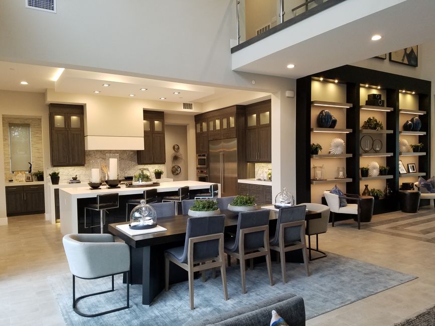 Modern open-plan kitchen and dining area in a residential setting in Irvine, CA.